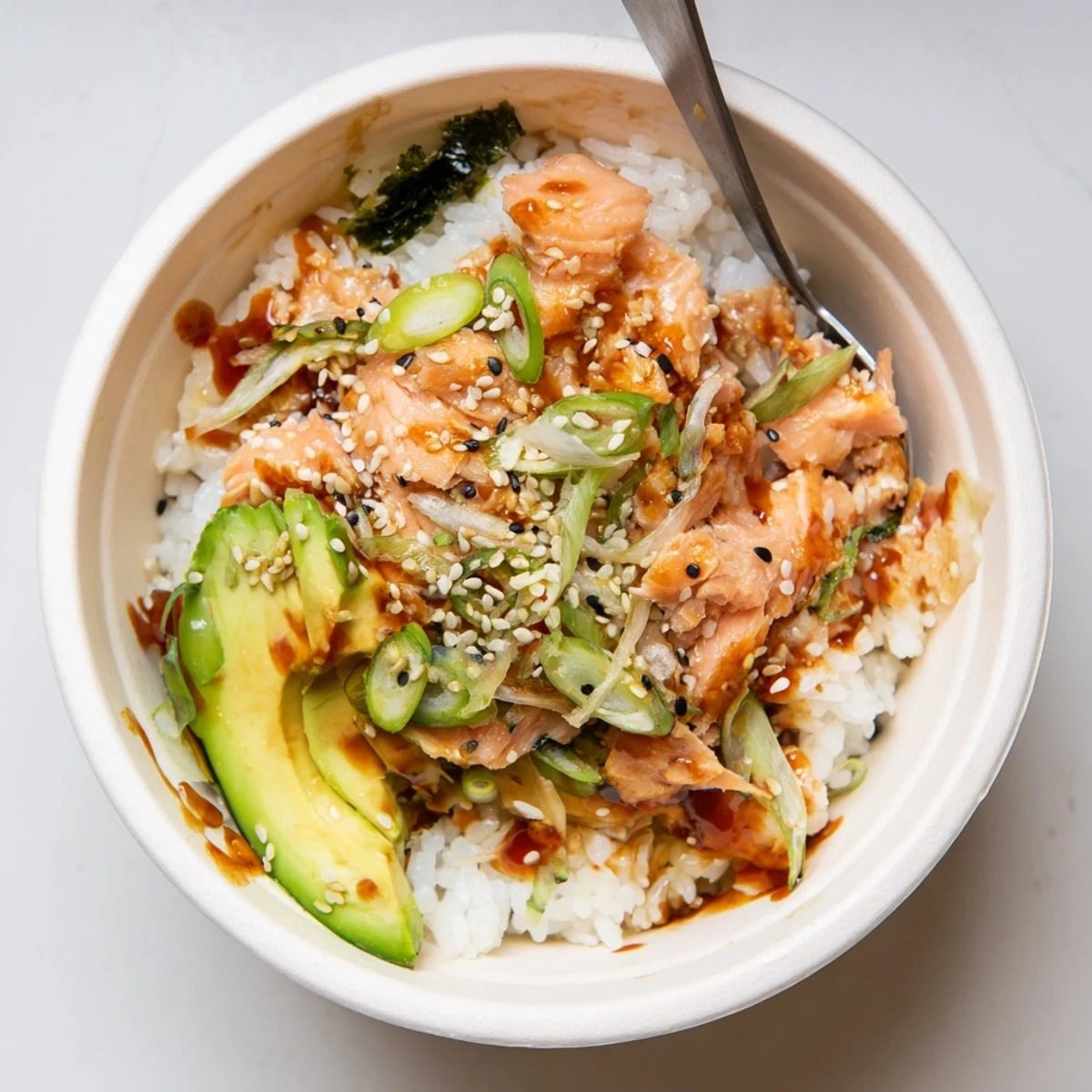 Quick and easy leftover salmon and rice bowl, perfect for a nutritious meal.