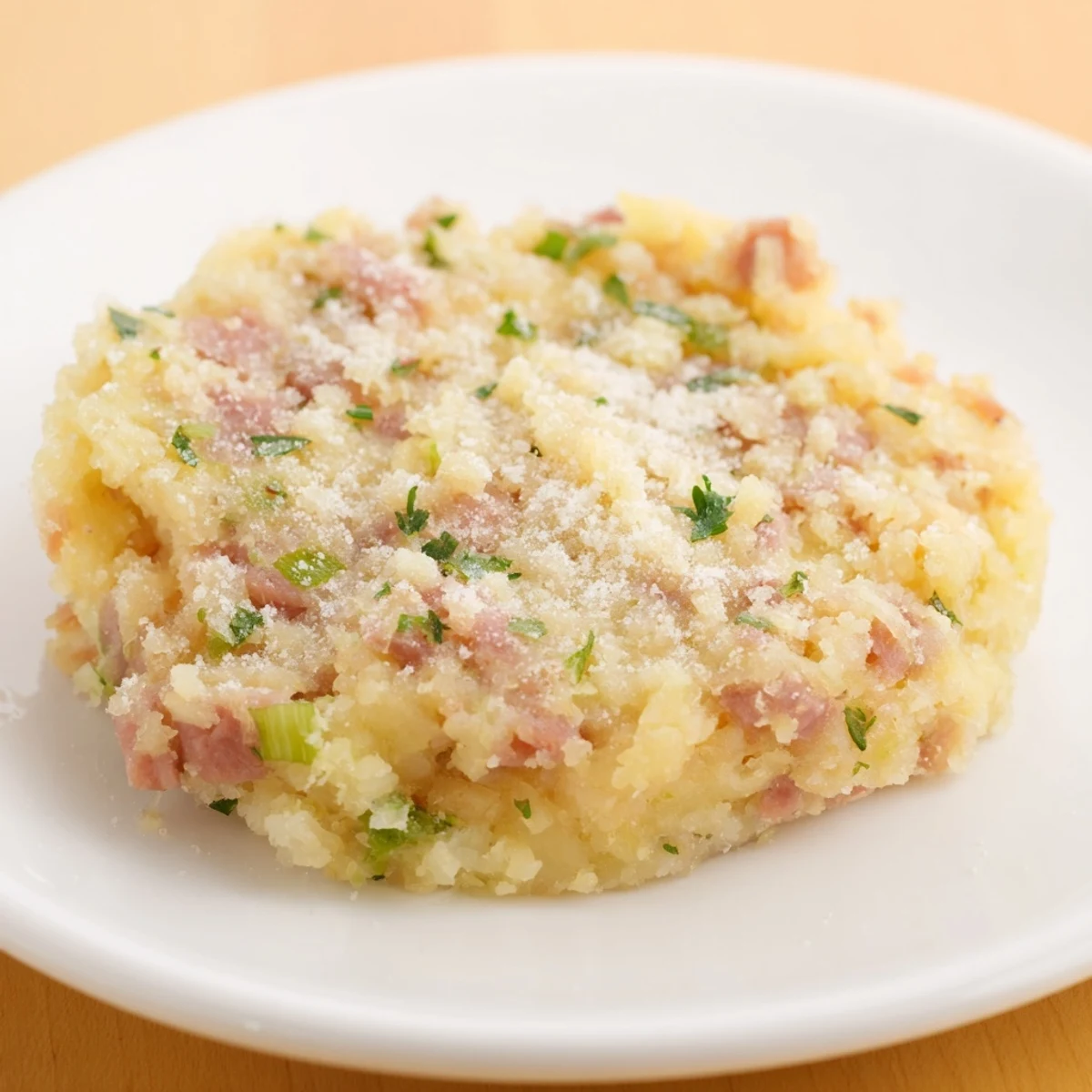 Crispy, golden-brown Depression-Era Ham & Potato Patties ready to be enjoyed, a budget-friendly meal.