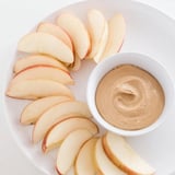 Delicious apple slices with peanut butter dip, a quick and healthy American snack.