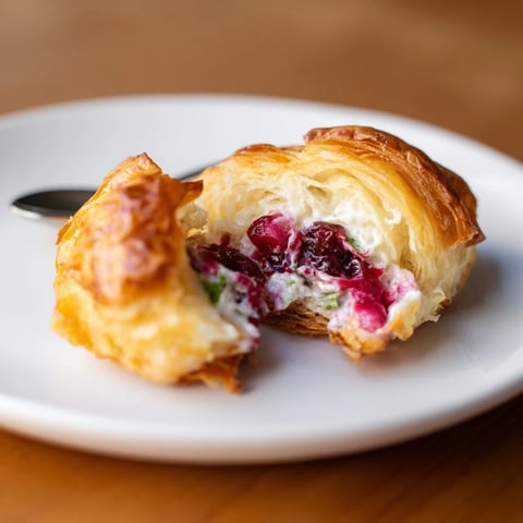 Flaky, golden Cranberry Jalapeño Dip Puff Croissants fresh out of the oven.  