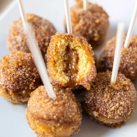 Soft chai caramel cinnamon sugar muffin pops with gooey centers, perfect for parties.  