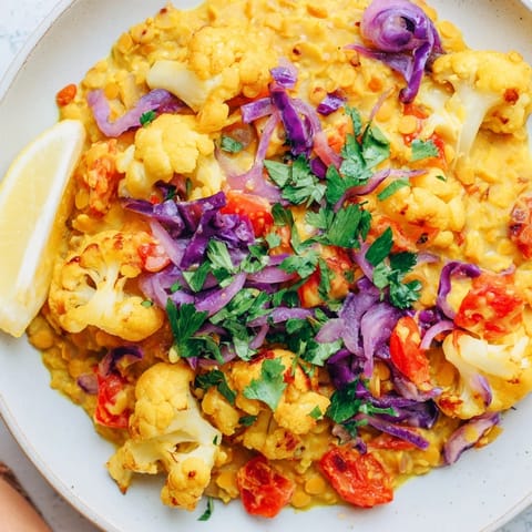 Steaming bowl of delicious Red Cabbage, Cauliflower & Coconut Dhal; imagine the rich aroma.