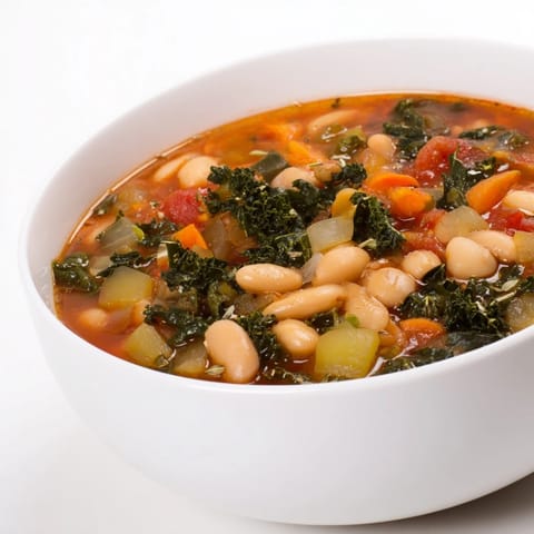This delicious Italian Bean & Kale Stew is full of savory vegetables and hearty flavors.