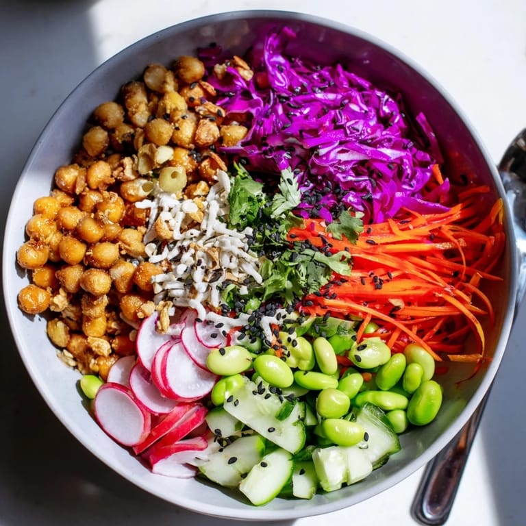 Delicious ASMR Crunch Snack Bowls topped with crunchy chickpeas and savory pumpkin seeds.