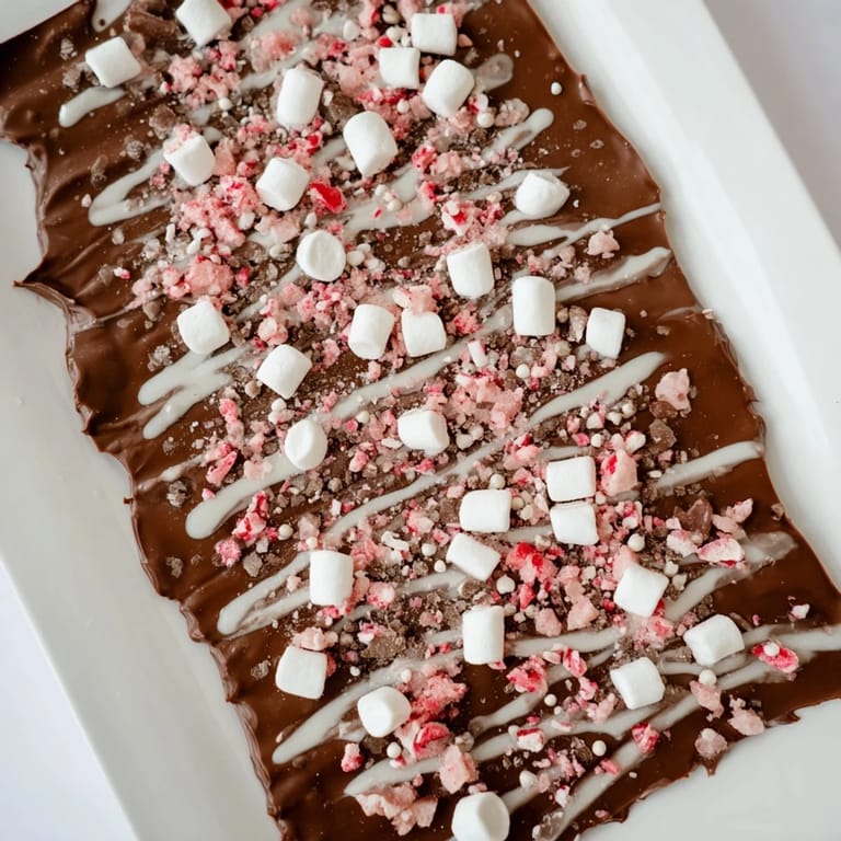 This easy Hot Chocolate Bomb Bark recipe yields a delicious, breakable dessert, ready to serve warm.