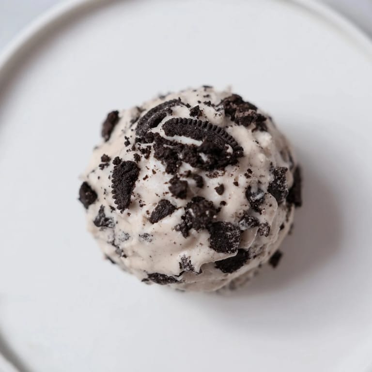 Homemade Cream Cheese Oreo Protein Balls: a delicious, no-bake snack with vanilla flavor and crunch.